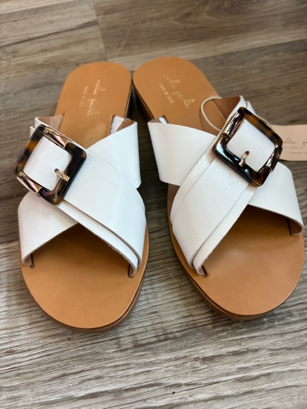Mila Paoli White Slide Sandals with Tortoiseshell Buckle Detail